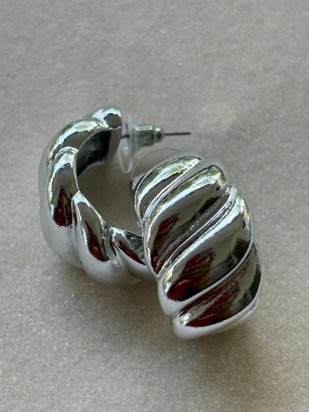 Silver swirl studs