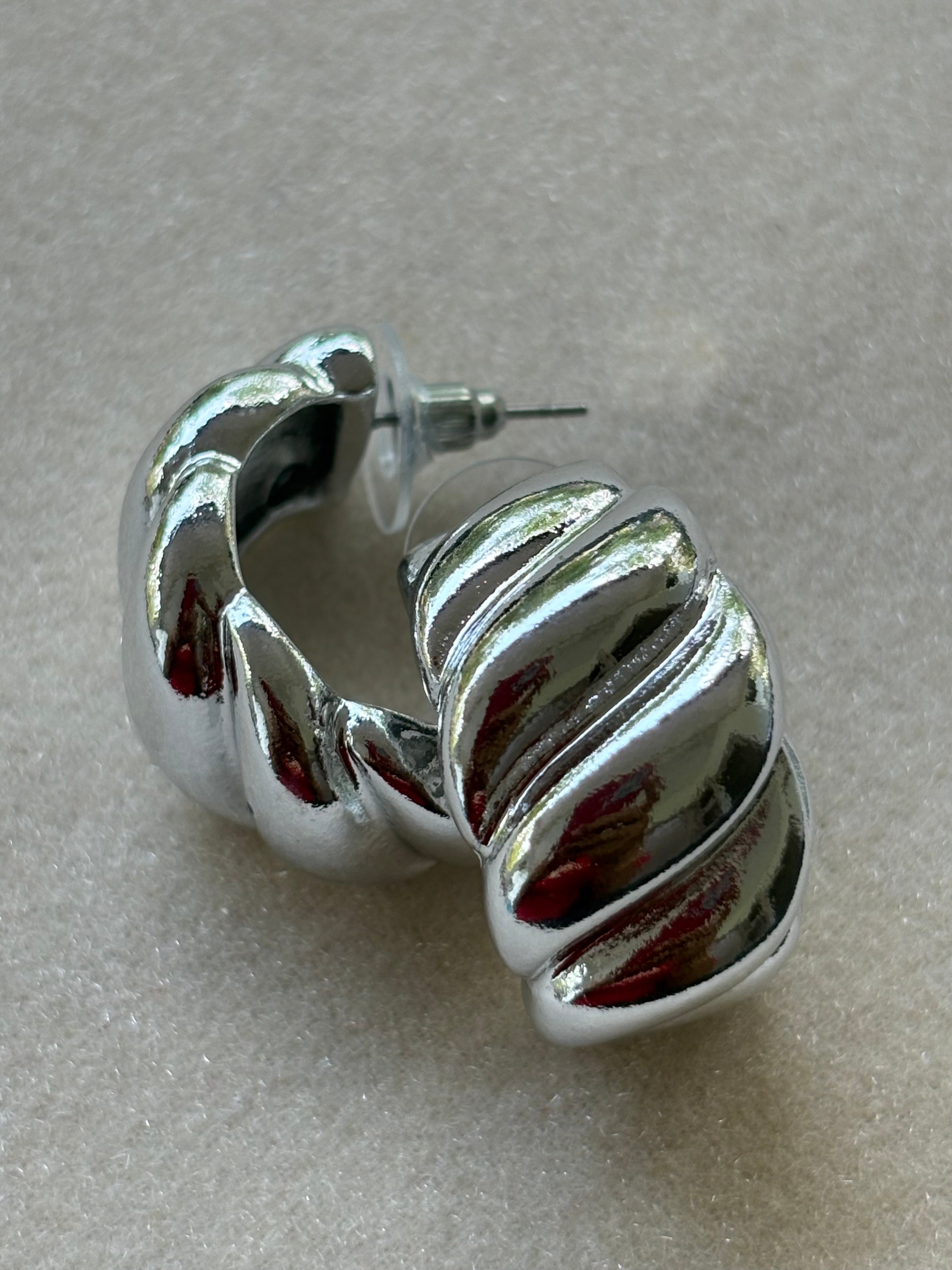 Silver swirl studs