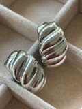 Silver swirl studs
